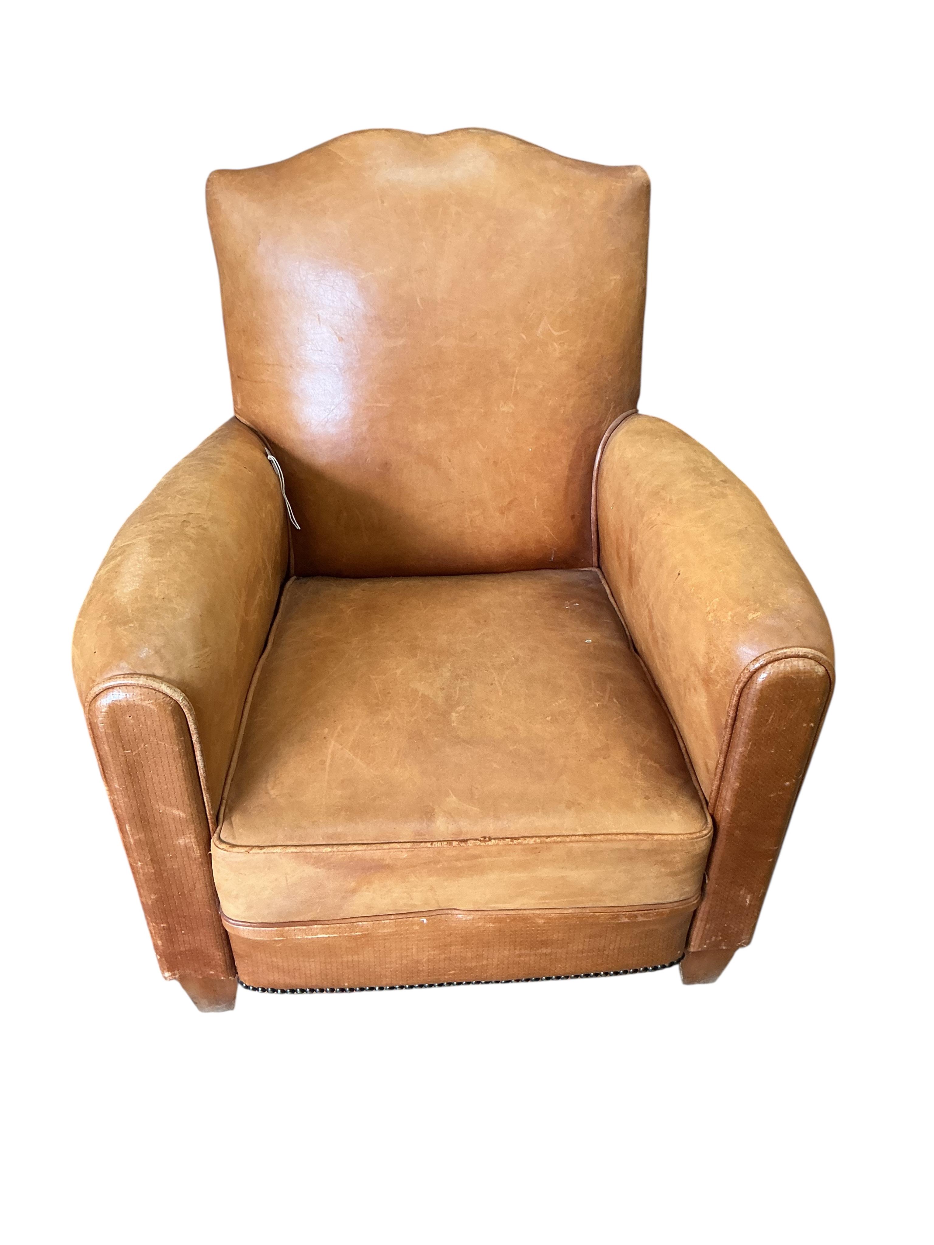 A French Art Deco tan leather club chair, width 73cm, depth 68cm, height 74cm